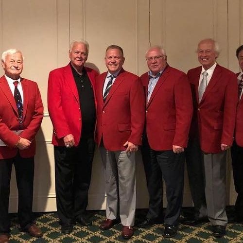 Mad Anthonys Awards Red Coat to Coach Kelly
